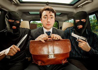 Image showing businessman grasped in hostages.