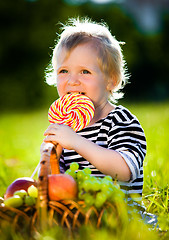 Image showing little boy with a sweet