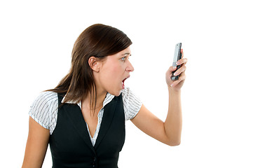 Image showing Angry businesswoman shouting to mobile