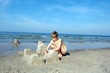 Image showing Boy playing on the beach