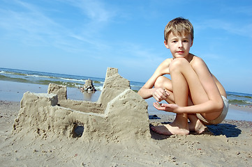 Image showing Boy playing on the beach