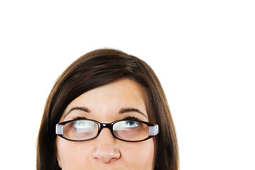 Image showing Thoughtful businesswoman looking up