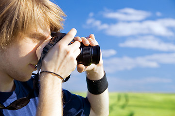 Image showing Photographer taking pictures