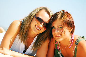 Image showing Young girls on the summer beach