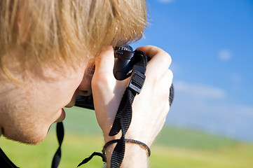 Image showing Photographer taking pictures