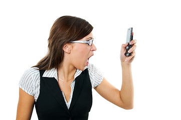 Image showing Angry businesswoman shouting to mobile