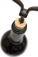 Image showing Uncorking a Wine Bottle (Top View)