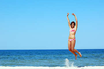 Image showing Atrractive young woman showing happiness