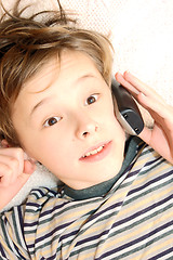 Image showing Teen boy talking on cell phone