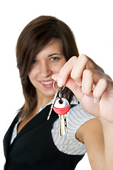 Image showing Smiling developer gives keys to new home