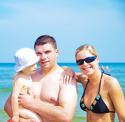 Image showing Happy family on the beach