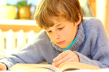 Image showing Boy doing homework