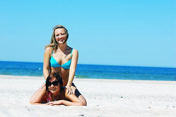 Image showing Young girls on the summer beach