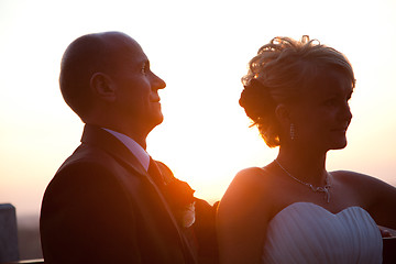 Image showing Bride and groom portrait at sunset