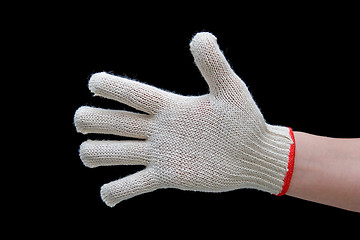 Image showing Hand in safety glove isolated on black