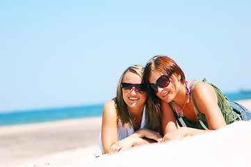 Image showing Young girls on the summer beach