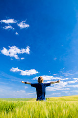 Image showing Happy man with arms up