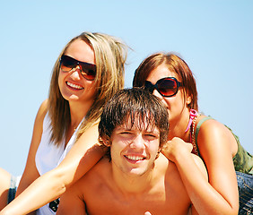 Image showing Young friends on the summer beach