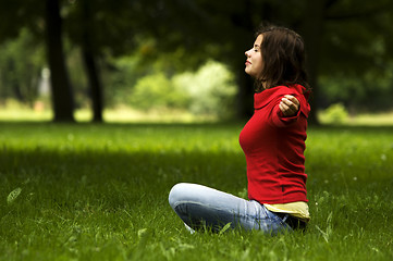 Image showing Young woman doing yoga