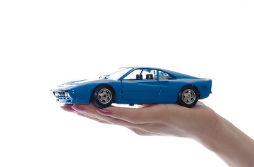 Image showing Car toy on palm