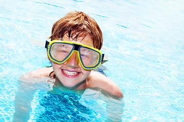 Image showing Happy boy in a pool