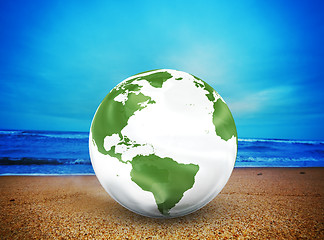 Image showing Planet earth model on the beach