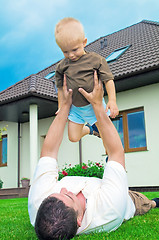 Image showing Father having fun with a son