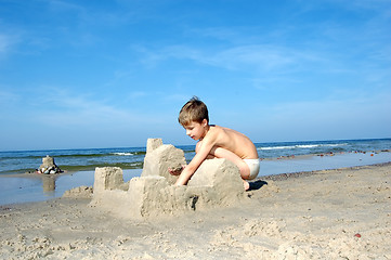 Image showing Boy playing on the beach