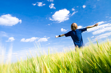 Image showing Happy man with arms up