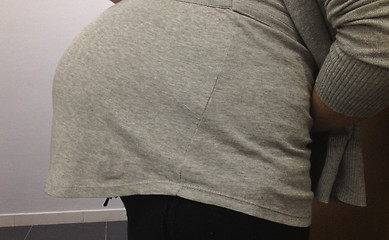 Image showing Belly of a Nine Months Pregnant Woman