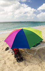 Image showing Sandy Beach with colorful Beach Umbrella