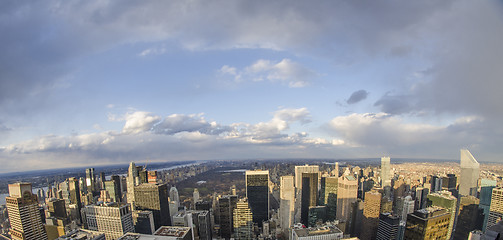 Image showing Giant Skyscrapers Exterior with Clouds in Background