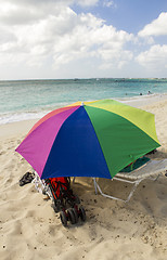 Image showing Sandy Beach with colorful Beach Umbrella