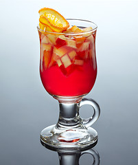 Image showing glass of tea with fresh fruits and syrup