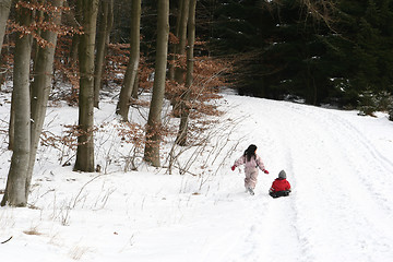 Image showing child playing in the snow