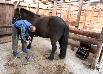 Image showing Blacksmith at work