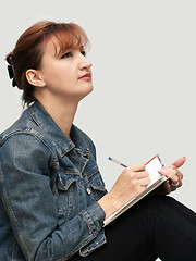 Image showing Casual woman with her diary