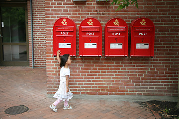 Image showing girl and postboxes