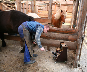 Image showing Blacksmith at work