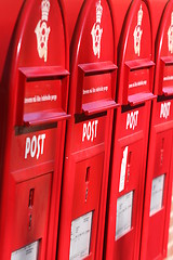 Image showing red post boxes