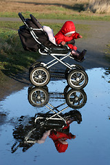 Image showing child in a carriage