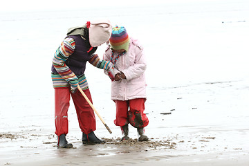 Image showing sisters playing