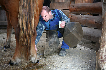 Image showing Blacksmith at work