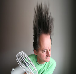 Image showing Man with hair dryer
