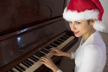 Image showing woman and piano