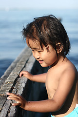 Image showing child  and water