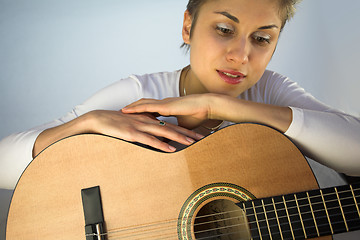 Image showing woman and guitar