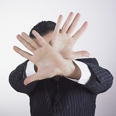 Image showing Businessman hiding