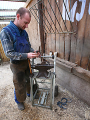 Image showing Blacksmith at work