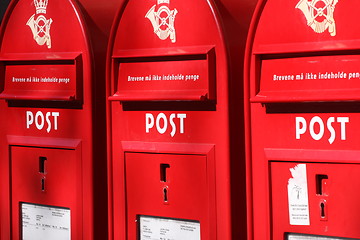 Image showing red post boxes